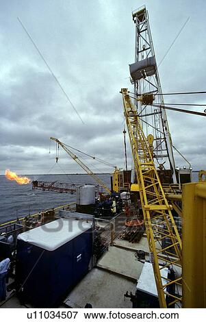 Gas Flaring from Offshore Oil Drilling Rig View Large Photo Image Stock Photo - Gas Flaring from Offshore Oil Drilling Rig. Fotosearch