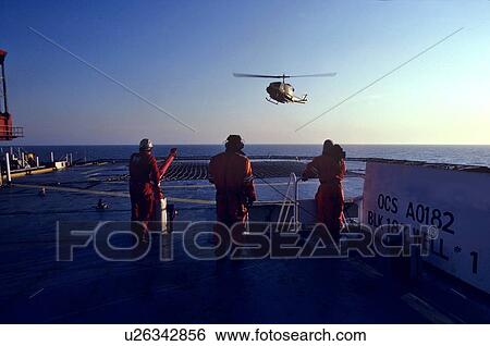 Helicopter Landong on Offshore Oil Drilling Rig View Large Photo Image Stock Photograph - Helicopter Landong on Offshore Oil Drilling Rig. Fotosearch
