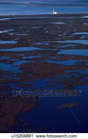 Stock Image - Inland Water Oil Drilling Barge. Fotosearch