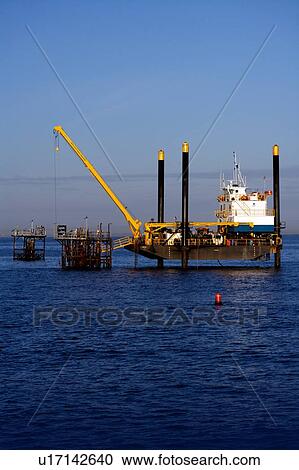 Stock Image - Liftboat Performing Production Platform Maintenance. Fotosearch