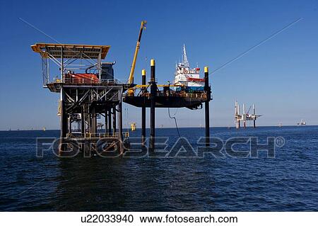 Stock Image - Liftboat Performing Production Platform Maintenance. Fotosearch