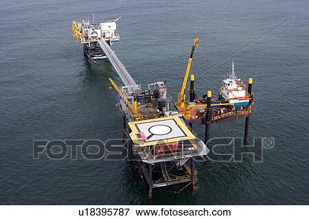 Stock Photo - Liftboat Performing Production Platform Maintenance. Fotosearch