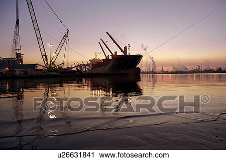 Offloading Cargo from Cargo Ship View Large Photo Image Stock Image - Offloading Cargo from Cargo Ship. Fotosearch