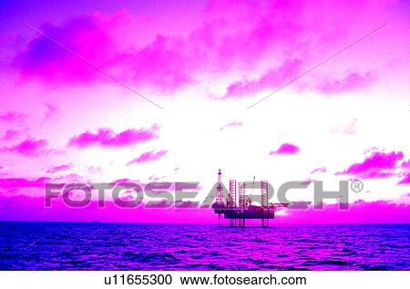 Offshore Oil Drilling Rig at Sunset View Large Photo Image Stock Image - Offshore Oil Drilling Rig at Sunset. Fotosearch