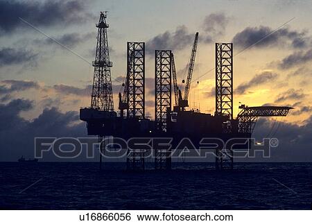Offshore Oil Drilling Rig at Sunset View Large Photo Image Stock Photograph - Offshore Oil Drilling Rig at Sunset. Fotosearch