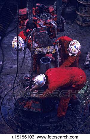 Stock Image - Offshore Oil Drilling Rig Crew. Fotosearch