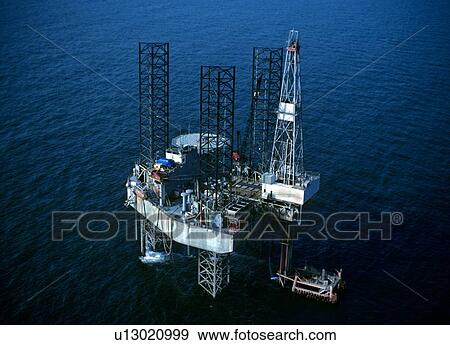 Offshore Oil Drilling Rig Operating over Jacket View Large Photo Image Stock Photo - Offshore Oil Drilling Rig Operating over Jacket. Fotosearch