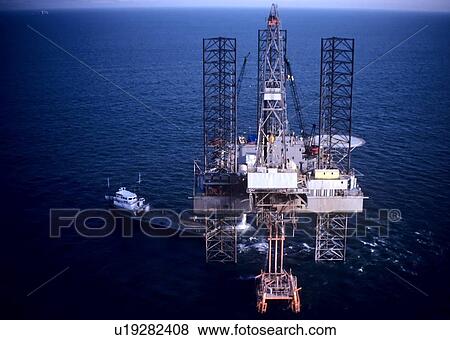 Offshore Oil Drilling Rig Operating over Jacket View Large Photo Image Stock Photo - Offshore Oil Drilling Rig Operating over Jacket. Fotosearch
