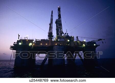 Stock Photo - Offshore Oil Drilling Rig Silhouette. Fotosearch