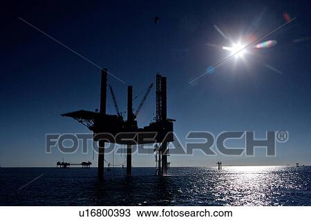 Offshore Oil Drilling Rig with Water Reflection View Large Photo Image Stock Image - Offshore Oil Drilling Rig with Water Reflection. Fotosearch