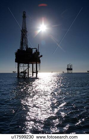 Offshore Oil Drilling Rig with Water Reflection View Large Photo Image Stock Image - Offshore Oil Drilling Rig with Water Reflection. Fotosearch