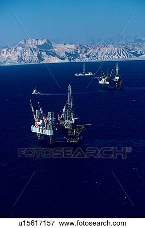 Offshore Oil Drilling Rigs in Gulf of Suez View Large Photo Image Stock Photo - Offshore Oil Drilling Rigs in Gulf of Suez. Fotosearch