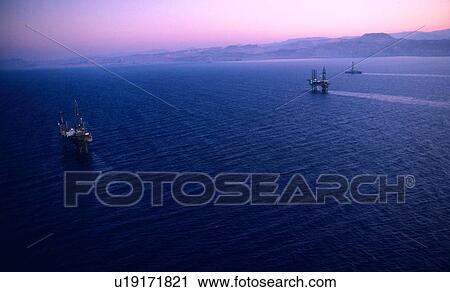 Stock Image - Offshore Oil Drilling Rigs Working in the Gulf of Suez. Fotosearch