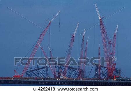Offshore Production Jacket and Cranes in Shipyard View Large Photo Image Stock Photo - Offshore Production Jacket and Cranes in Shipyard. Fotosearch