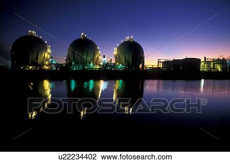 Oil Refinery and Spherical Storage Tanks Reflected in Water at Night View Large Photo Image Stock Image - Oil Refinery and Spherical Storage Tanks Reflected in Water at Night. Fotosearch