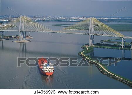Oil Tanker in Houston Ship Channel Passing Under Fred Hartman Bridge View Large Photo Image Stock Image - Oil Tanker in Houston Ship Channel Passing Under Fred Hartman Bridge. Fotosearch