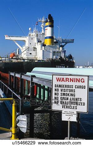 Oil Tanker in Port with Dangerous Cargo Warning Sign View Large Photo Image Stock Photo - Oil Tanker in Port with Dangerous Cargo Warning Sign. Fotosearch