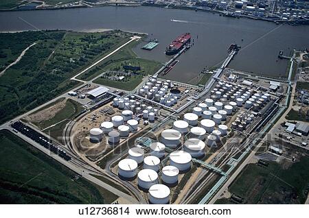 Picture - Oil Tanker Offloading at Oil Storage Facility. Fotosearch