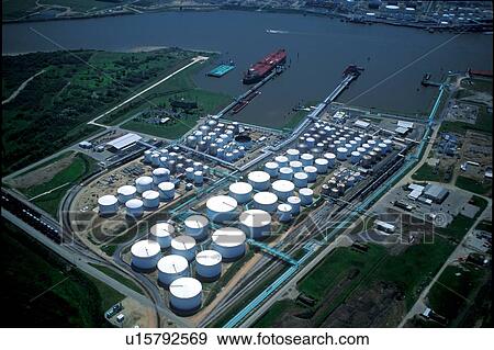 Oil Tanker Offloading at Oil Storage Facility View Large Photo Image Stock Photo - Oil Tanker Offloading at Oil Storage Facility. Fotosearch