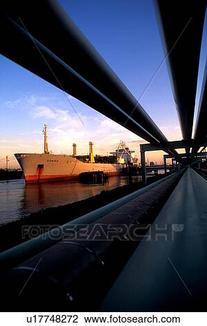 Stock Image - Oil Tanker Offloading in Houston Ship Channel. Fotosearch