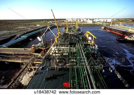 Stock Image - Oil Tanker Offloading in Houston Ship Channel. Fotosearch