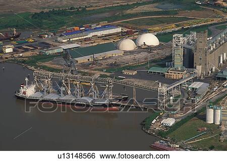 Stock Photograph - Oil Tanker Offloading in Houston Ship Channel. Fotosearch