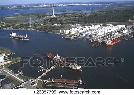Oil Tankers in Houston Ship Channel and San Jacinto Monument in Background View Large Photo Image Stock Photo - Oil Tankers in Houston Ship Channel and San Jacinto Monument in Background. Fotosearch