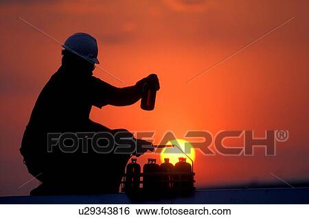 Oilfield Technician Inspecting Fluids View Large Photo Image Stock Photograph - Oilfield Technician Inspecting Fluids. Fotosearch