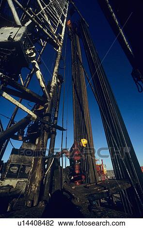 Oilfield Worker at Drilling Site View Large Photo Image Stock Image - Oilfield Worker at Drilling Site. Fotosearch