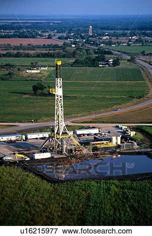 Stock Photo - Onshore Oil Drilling Rig in Farmland. Fotosearch