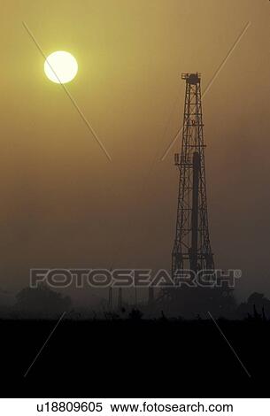 Onshore Oil Drilling Rig Silhouette and Sun View Large Photo Image Stock Photography - Onshore Oil Drilling Rig Silhouette and Sun. Fotosearch