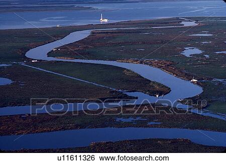 Shallow Water Oil Drilling Barge Operating in Coastal Water View Large Photo Image Stock Photograph - Shallow Water Oil Drilling Barge Operating in Coastal Water. Fotosearch