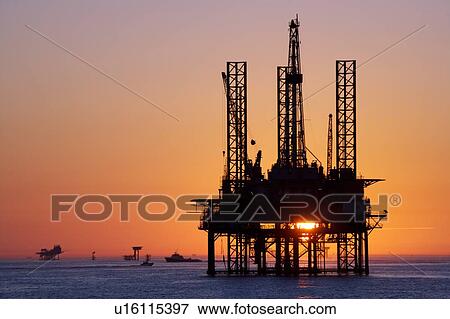 Silhouete of Offshore Oil Drilling Rig at Sunset View Large Photo Image Stock Photo - Silhouete of Offshore Oil Drilling Rig at Sunset. Fotosearch