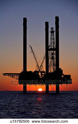 Silhouete of Offshore Oil Drilling Rig at Sunset View Large Photo Image Stock Photography - Silhouete of Offshore Oil Drilling Rig at Sunset. Fotosearch