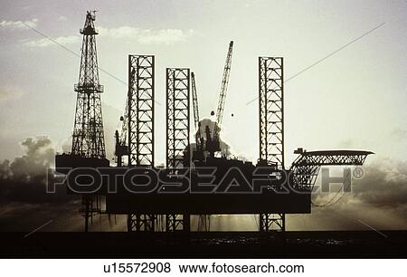 Stock Photo - Silhouette of Offshore Oil Drilling Rig. Fotosearch
