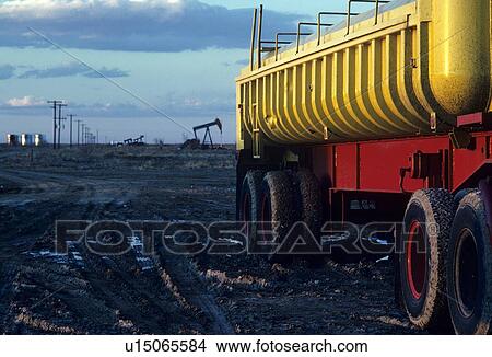 Tanker Truck at Well Site View Large Photo Image Picture - Tanker Truck at Well Site. Fotosearch