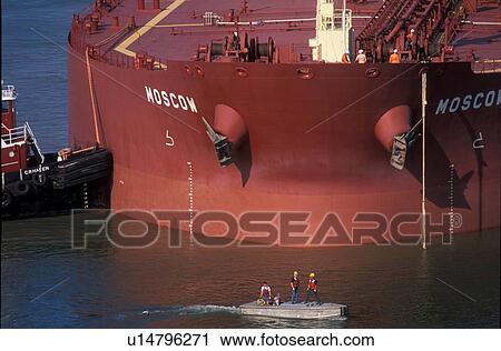 Tugboat Moving Oil Tanker View Large Photo Image Stock Image - Tugboat Moving Oil Tanker. Fotosearch