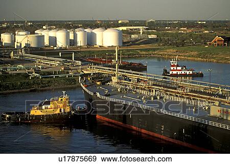 Tugboats Moving Oil Tanker in Channel View Large Photo Image Stock Photo - Tugboats Moving Oil Tanker in Channel. Fotosearch