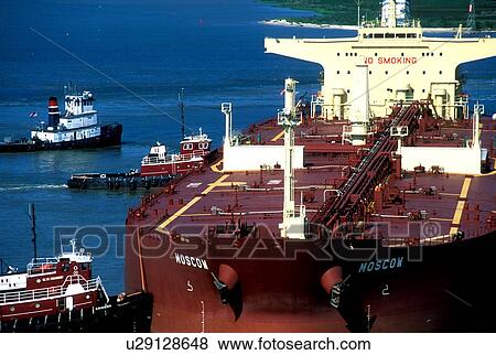 Tugboats Moving Oil Tanker View Large Photo Image Stock Photo - Tugboats Moving Oil Tanker. Fotosearch