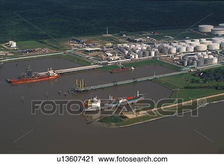 Two Oil Tankers Offloading at Oil Storage Facility View Large Photo Image Stock Image - Two Oil Tankers Offloading at Oil Storage Facility. Fotosearch