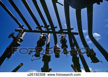 Stock Photo - Valves in Hanging in Storage. Fotosearch