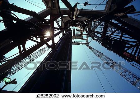 Stock Image - View of Offshore Oil Drilling Rig Derrick Looking Upward. Fotosearch
