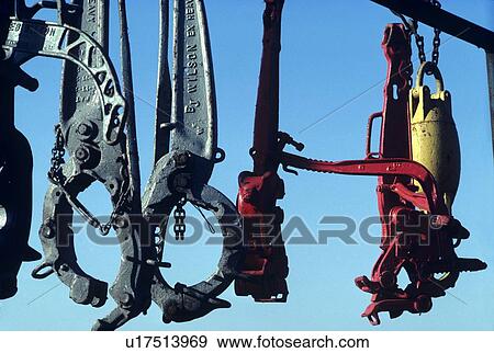 Stock Photo - Wrenches and Tongs Stored on Offshore Oil Drilling Rig. Fotosearch