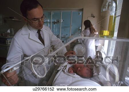 Stock Image - 4437, people, doctor, person, hand, baby. Fotosearch