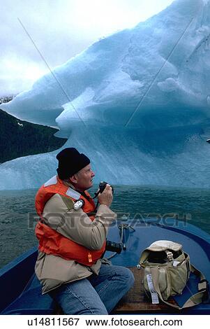 Stock Photo - alaska, small, bay, glacier, boat, photographer. Fotosearch