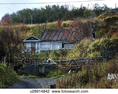 Stock Image - alexandrovsk, house, russia, home, person, people. Fotosearch