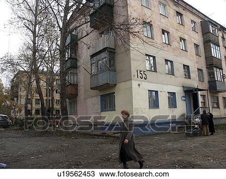 Stock Image - apartment, house, russia, home, person, people. Fotosearch