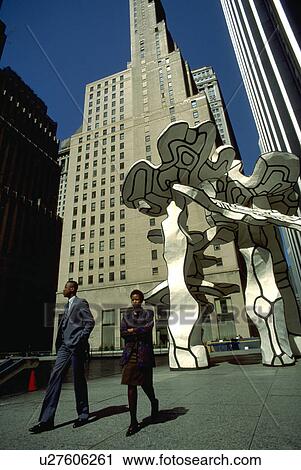 Stock Image - area, spring, downtown, sculpture, art, people. Fotosearch
