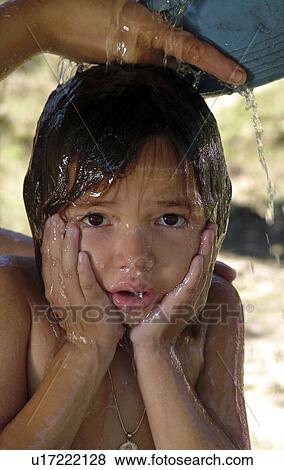 bath, girl, taking, honduras, person, people View Large Photo Image Stock Photo - bath, girl, taking, honduras, person, people. Fotosearch