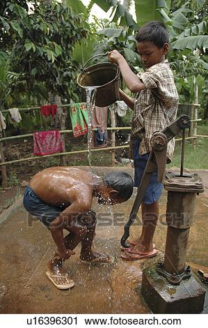 Stock Image - bath, person, taking, boys, cambodia, people. Fotosearch
